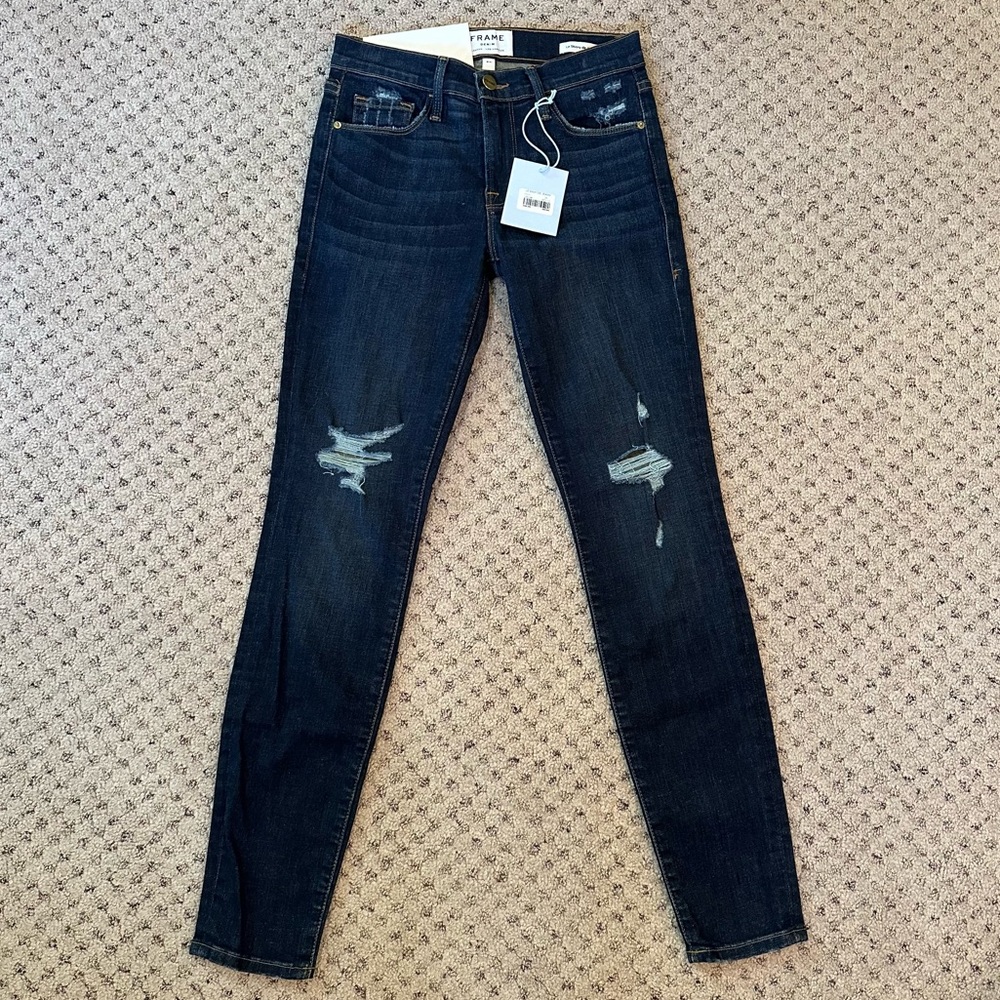 Frame Denim le skinny de jeann distressed mid rise jeans